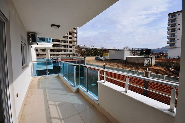 شقة ضمن مجمع سكني حديث في منطقة محمود لار – ألانيا