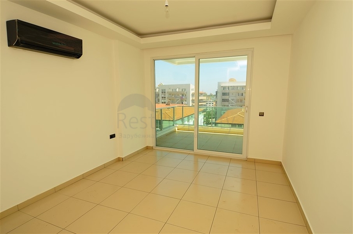 شقة بإطلالة جبلية وبحرية في منطقة توسمور – ألانيا