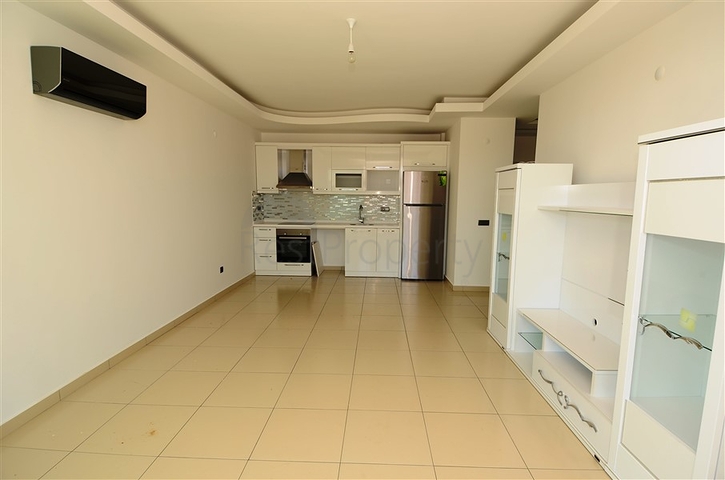 شقة بإطلالة جبلية وبحرية في منطقة توسمور – ألانيا