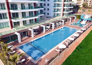 شقة بإطلالة جبلية وبحرية في منطقة توسمور – ألانيا