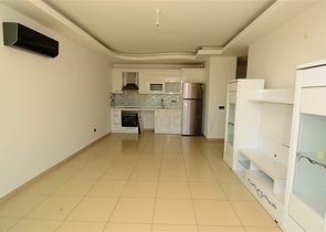 شقة بإطلالة جبلية وبحرية في منطقة توسمور – ألانيا