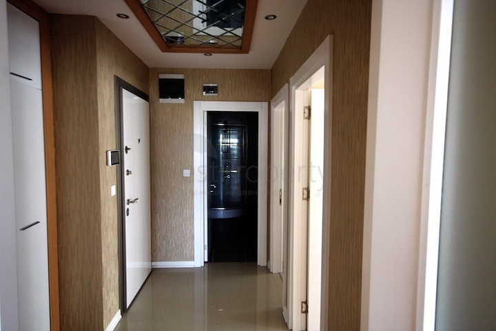 شقة ضمن مجمع سكني مميز في حي ليمان من منطقة كونيالتي – أنطاليا