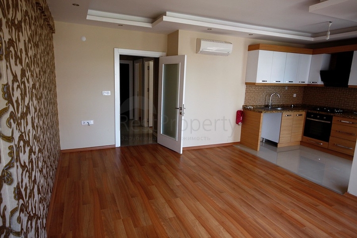 شقة ضمن مجمع سكني مميز في حي ليمان من منطقة كونيالتي – أنطاليا