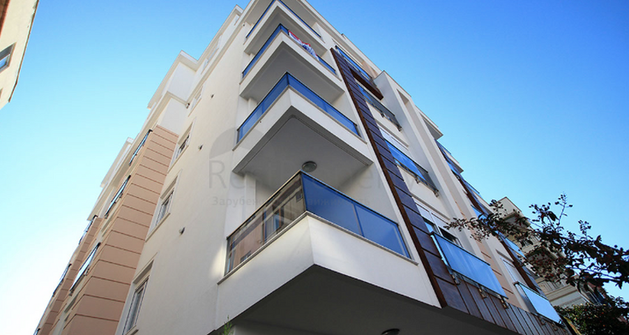 شقة ضمن مجمع سكني مميز في حي ليمان من منطقة كونيالتي – أنطاليا