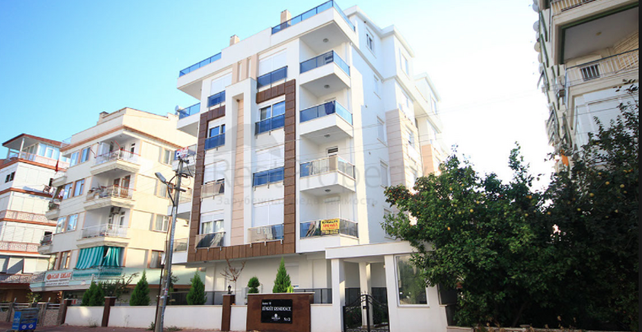 شقة ضمن مجمع سكني مميز في حي ليمان من منطقة كونيالتي – أنطاليا