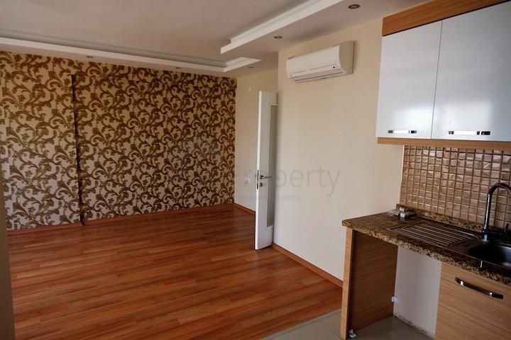 شقة ضمن مجمع سكني مميز في حي ليمان من منطقة كونيالتي – أنطاليا