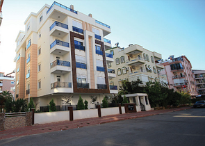 شقة ضمن مجمع سكني مميز في حي ليمان من منطقة كونيالتي – أنطاليا