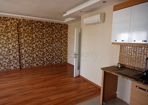 شقة ضمن مجمع سكني مميز في حي ليمان من منطقة كونيالتي – أنطاليا