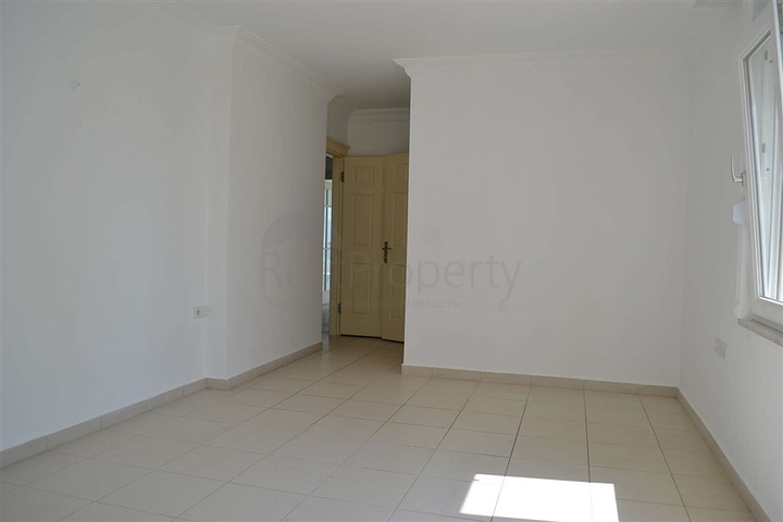 شقة ضمن مجمع سكني مميز في منطقة محمود لار – ألانيا 