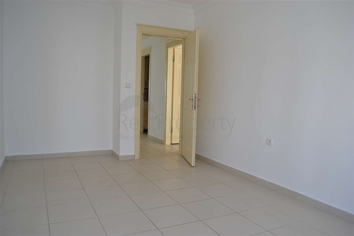 شقة ضمن مجمع سكني مميز في منطقة محمود لار – ألانيا 