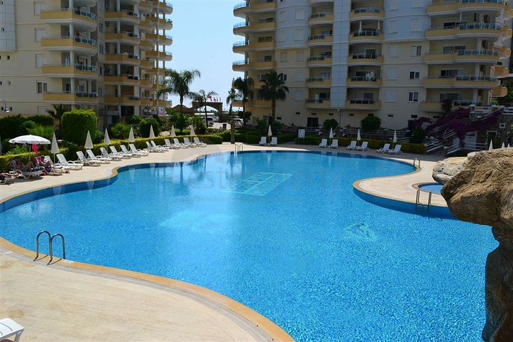 شقة ضمن مجمع سكني مميز في منطقة محمود لار – ألانيا 