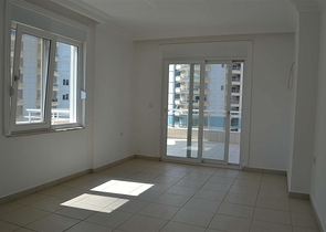 شقة ضمن مجمع سكني مميز في منطقة محمود لار – ألانيا 