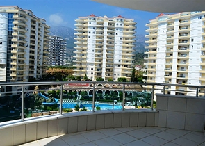 شقة ضمن مجمع سكني مميز في منطقة محمود لار – ألانيا 