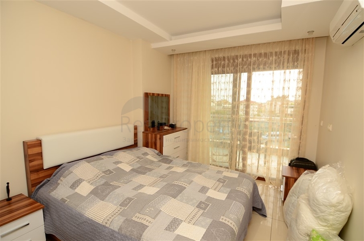 شقة ضمن مجمع مع بنية تحتية ممتازة في منطقة جيكجيلي – ألانيا 