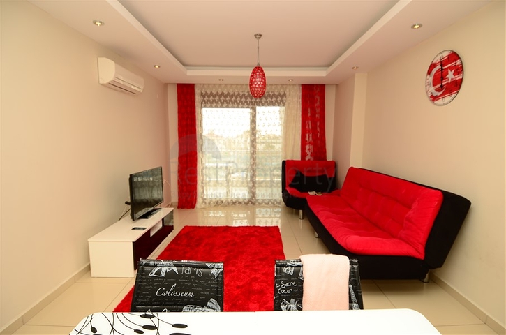 شقة ضمن مجمع مع بنية تحتية ممتازة في منطقة جيكجيلي – ألانيا 