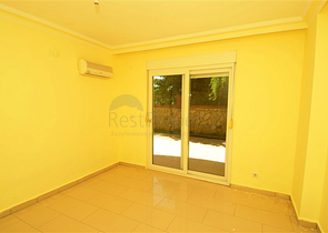 شقة ضمن مجمع سكني على الخط الأول من البحر في منطقة ديمرتاش – ألانيا