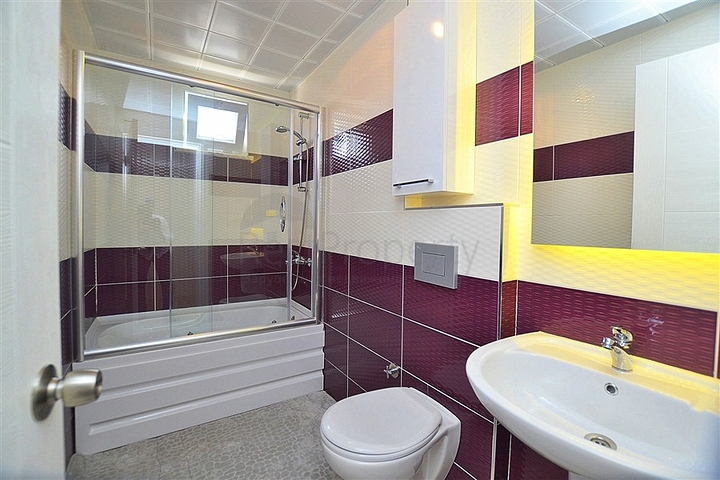 شقة مفروشة بإطلالة بحرية وجبلية في منطقة محمودلار – ألانيا