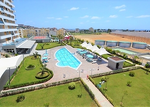 شقة ضمن مجمع سكني فاخر حديث في منطقة أفسلار – ألانيا