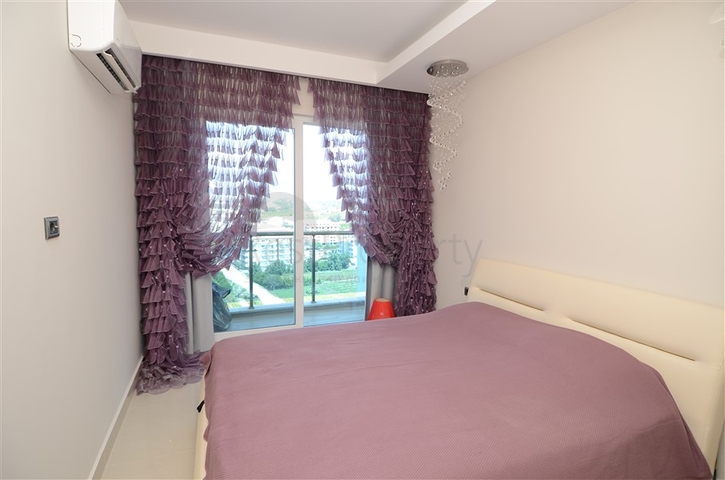 شقة مفروشة بإطلالة بحرية ساحرة في منطقة محمود لار – ألانيا