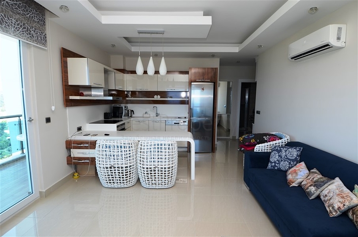 شقة مفروشة بإطلالة بحرية ساحرة في منطقة محمود لار – ألانيا