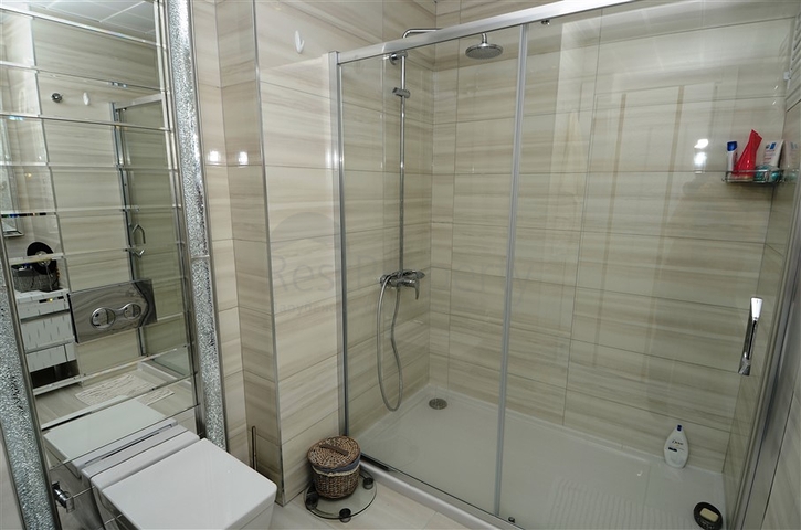 شقة مفروشة بإطلالة بحرية ساحرة في منطقة محمود لار – ألانيا