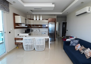 شقة مفروشة بإطلالة بحرية ساحرة في منطقة محمود لار – ألانيا