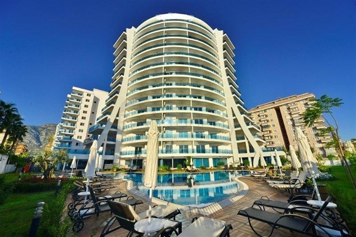 شقة ضمن مجمع سكني على الخط الأول من البحر في منطقة محمود لار – ألانيا