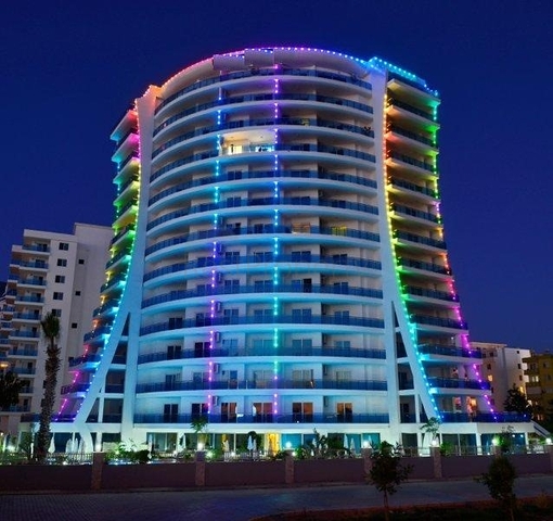 شقة ضمن مجمع سكني على الخط الأول من البحر في منطقة محمود لار – ألانيا