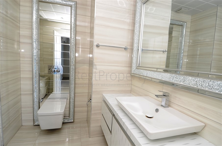 شقة ضمن مجمع سكني على الخط الأول من البحر في منطقة محمود لار – ألانيا