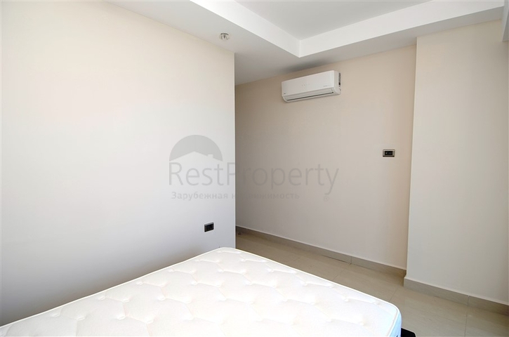 شقة ضمن مجمع سكني على الخط الأول من البحر في منطقة محمود لار – ألانيا