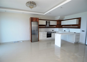 شقة ضمن مجمع سكني على الخط الأول من البحر في منطقة محمود لار – ألانيا