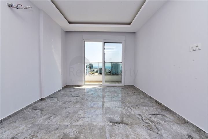 دوبلكس فاخرة - تراس واسع باطلالة بحر - ضمن مجمع سكني في مهموتلار / الانيا 