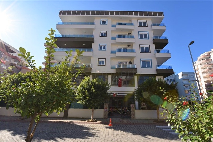 شقق بتصاميم متنوعة -بناء سكني قريب من البحر - مهموتلار / الانيا  