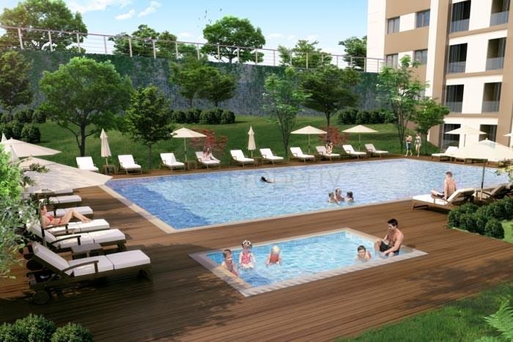 شقق عائلية ضمن مجمع سكني حديث في منطقة بيلك دوزو في اسطنبول 