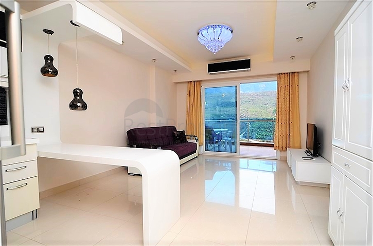 اسكن او استثمر - شقة فاخرة بتصميم غرفة وصالة ضمن مجمع 5 نجوم في الانيا 