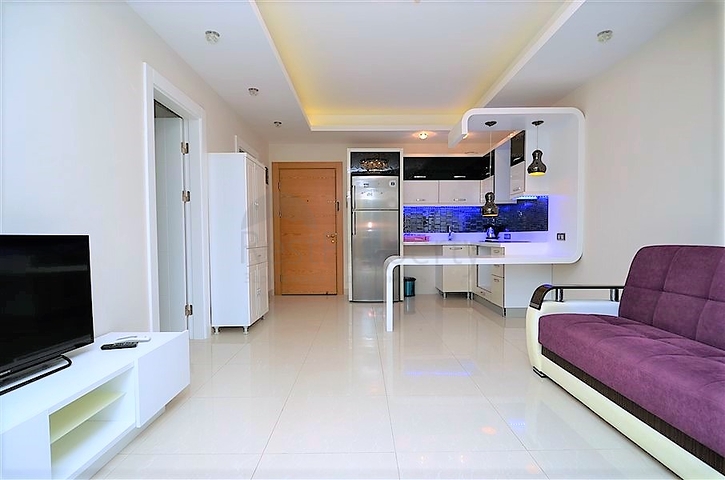 اسكن او استثمر - شقة فاخرة بتصميم غرفة وصالة ضمن مجمع 5 نجوم في الانيا 