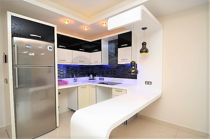 اسكن او استثمر - شقة فاخرة بتصميم غرفة وصالة ضمن مجمع 5 نجوم في الانيا 