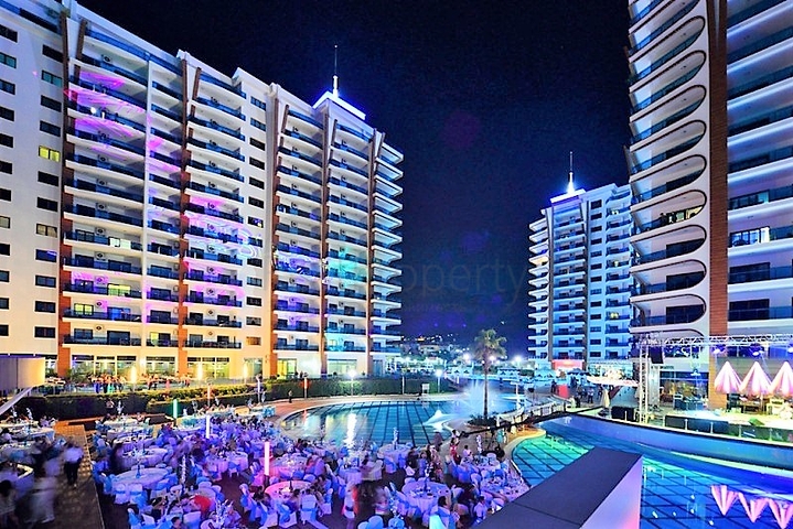 اسكن او استثمر - شقة فاخرة بتصميم غرفة وصالة ضمن مجمع 5 نجوم في الانيا 