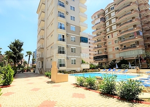 شقة من تصميم غرفة نوم وصالة - مؤثثة ضمن مجمع في منطقة حيوية ضمن مهموتلار