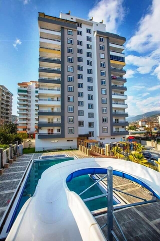 شقة فاخرة - مجمع سكني حديث - في مهموتلار / الانيا 