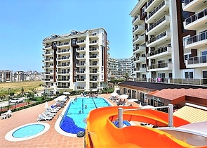 شقة غرفتين وصالة مفروشة ضمن مجمع عائلي في الانيا - افسلار 