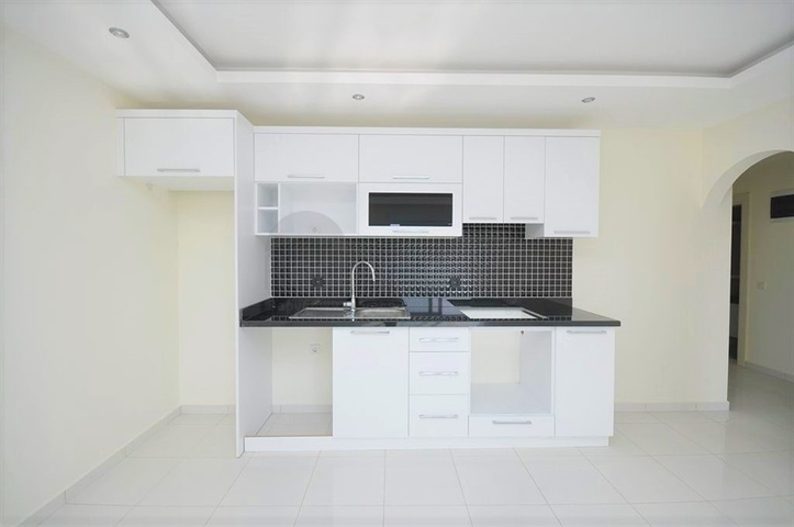 شقة غرفة نوم وصالة ضمن مجمع سكني قريب من البحر في مهموتلار / الانيا 