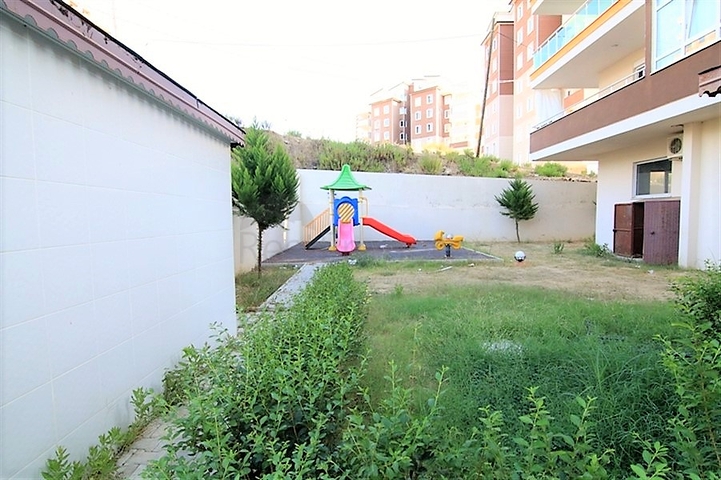 شقة غرفة نوم وصالة ضمن مجمع سكني  في مهموتلار / الانيا 