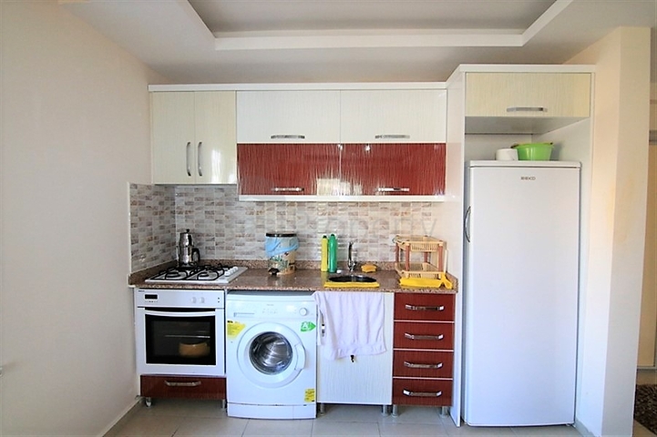 شقة غرفة نوم وصالة ضمن مجمع سكني  في مهموتلار / الانيا 