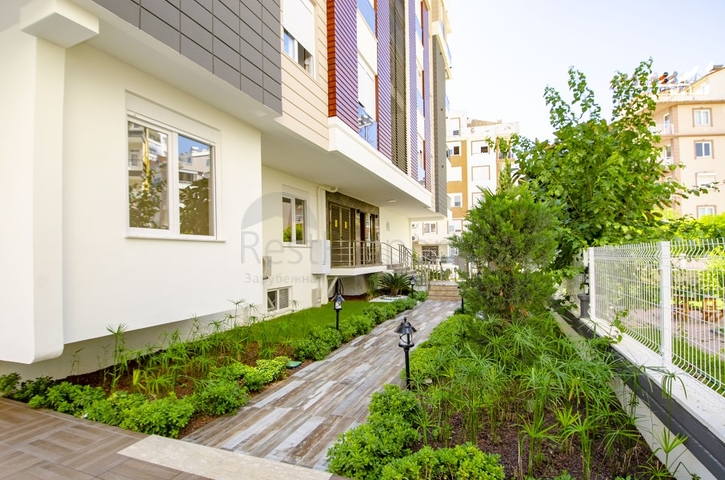 شقة 2 + 1 تطل على حمام السباحة في مجمع جديد في ليمان