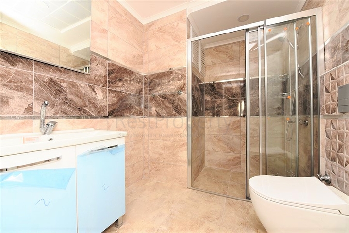 شقة جديدة للبيع في مركز الانيا _ من تصميم غرفتين وصالة 