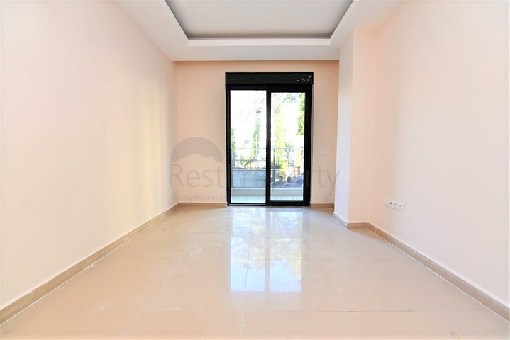 شقة جديدة للبيع في مركز الانيا _ من تصميم غرفتين وصالة 