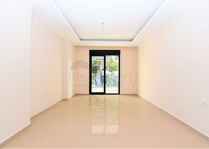 شقة جديدة للبيع في مركز الانيا _ من تصميم غرفتين وصالة 