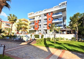 شقة جديدة للبيع في مركز الانيا _ من تصميم غرفتين وصالة 