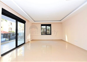 شقة جديدة للبيع في مركز الانيا _ من تصميم غرفتين وصالة 